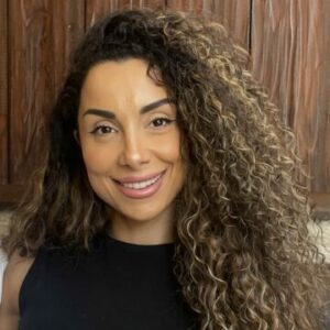 Smiling woman with curly hair