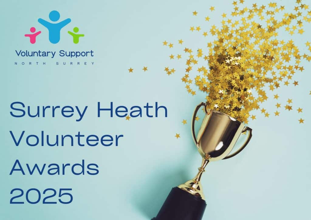 An award cup spraying gold glitter against a blue background with "Surrey Heath Volunteer Awards 2025" alongside